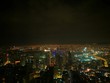 ILLUMINATED CITYSCAPE AGAINST SKY AT NIGHT