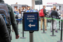 Posted Sign In An Airport Read "General Boarding Here" To Direct Passenger For TSA Security Check