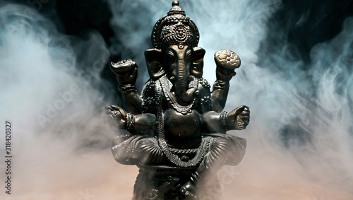 Cuadros en Lienzo Hindu god Ganesha on black background