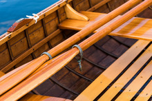 Close-Up Of Wooden Oars In Boat