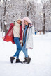 © Andrey_Arkusha - Portrait two young beautiful women walking in winter park
