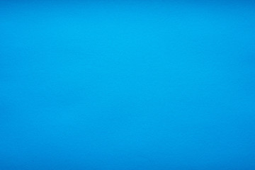 Grain light blue paint wall or red paper background or texture