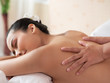 © xreflex - Hand of masseuse's on the backs of women. Asian woman are a relaxing on the bed. Massage and body care. Spa in salon