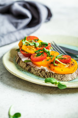 Wall Mural - Toast with cheese and tomato on plate, copy space. Vegetarian food concept.