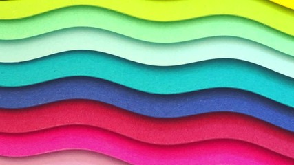 Wall Mural - Colorful wave bending paper animation. Abstract 4K 3D ripple motion background of pile of paper. Gradient and colorful looped floating motion
