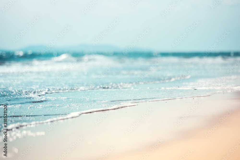 Close-up soft wave of the sea on the sandy beach - obrazy, fototapety, plakaty 