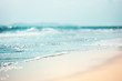 Leinwanddruck Bild - Close-up soft wave of the sea on the sandy beach