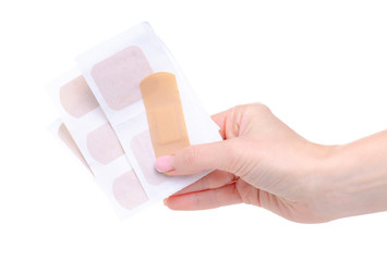 patch plaster in hand on white background isolation