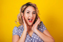 Girl With Red Lips And A Dress In Peas On A Yellow Background. Pin-up Portraits. Screaming In Delight