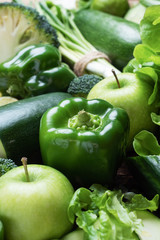 Background of fresh green vegetables and herbs. Close up.