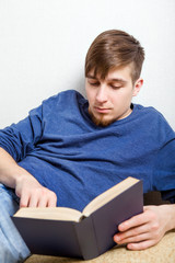 Wall Mural - Young Man read a Book