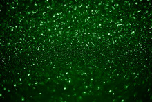 Green Sparkling Lights Festive Background With Texture.