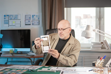 Poster - interface designer. device preview.the process of developing the design of mobile applications.a man