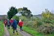 © aquaphoto - Pensioner hikers on a path on the coastline in Brittany. France