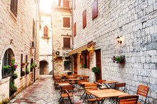 Cafe On The Street In Old Town In Kotor, Montenegro. Famous Travel Destination.