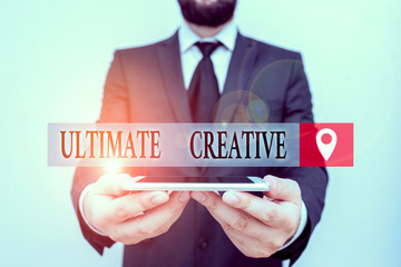 Leinwandbilder - Conceptual hand writing showing Ultimate Creative. Concept meaning way of producing or using original and unusual ideas Male human wear formal work suit hold smartphone using hand