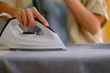 © GroovyGloryPhoto - wife house ironing the cloth