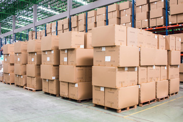 Wall Mural - Rows of material boxes or product boxes in warehouse area.