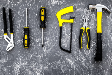 Wall Mural - Tools for repairing top view on stone background