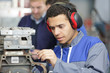 © auremar - factory worker with ear protection