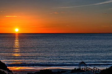 Sticker - Beautiful and serene ocean sunset sunrise.