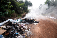 Garbage Pollution From Small Towns  Incinerated And Disposed Of Incorrectly A Source Of Pollution And Spread The Disease.Smoke Of Burning Garbage Into The Air- Pollution From Waste Garbage .
