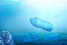 Underwater View With A Plastic Bottle On The Ocean
