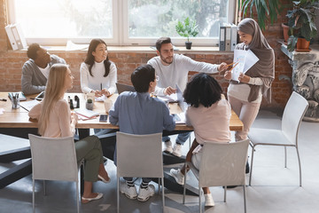 Poster - Young woman in hijab making business report, business meeting