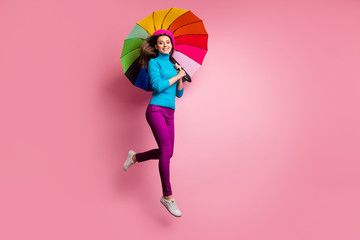 Wall Mural - full size photo of cheerful girl jump hold shine umbrella enjoy fall free time weekends feel content