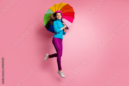 Cuadros en Lienzo Full size photo of cheerful girl jump hold shine umbrella enjoy fall free time w