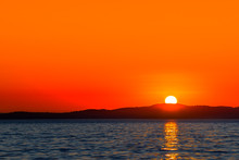 Beautiful Orange Sunset Over The Sea With Sun Reflection In The Water, Scenic View, Zadar, Dalmatia, Croatia