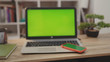 © america_stock - On tablet laptop computer with green screen chroma key display internet business office technology work desk connection keyboard pc device using close up slow motion