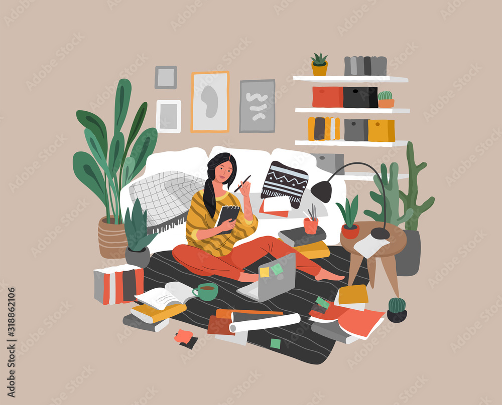A girl is sitting on the floor surrounded by a laptop, books and papers and writing in note. Woman studying or preparing for exams at home. Teen student studying hard In scandinavian - obrazy, fototapety, plakaty 