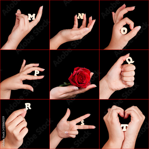 Obraz na plátne Hands with alphabet letters