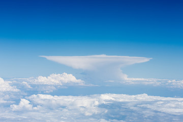 Cumulonimbus incus cloud taken from the flight deck of an airliner