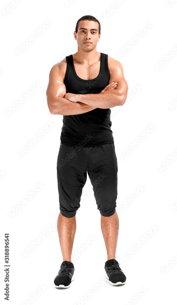 Sporty African-American man on white background