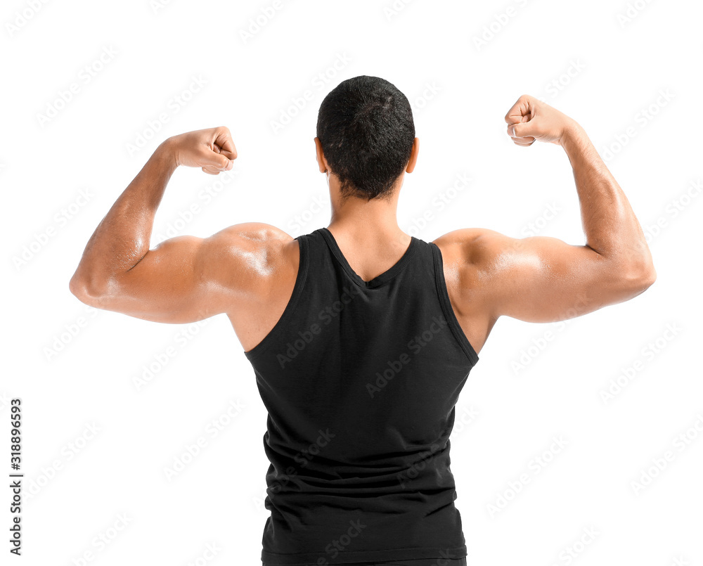 Sporty African-American man on white background