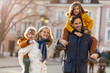 © pikselstock - Affectionate young family enjoying their day in a city