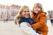 © pikselstock - Mother and cute little son hugging outdoors