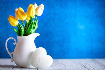 Wall Mural - greeting card with flowers and heart. background with copy space. selective focus.