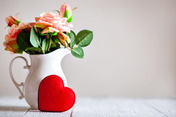 Wall Mural - greeting card with flowers and heart. background with copy space. selective focus.