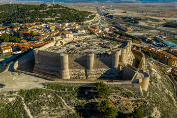 Wall Mural - Aerial view of Chinchilla de Montearagon castle with ruined excavated inner building remains surrounded by an outer wall with semi circular towers