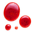 red raspberries jam splash isolated on white background