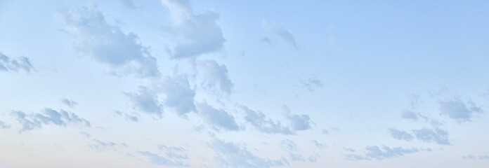 a beuatiful blue sky with clouds in the morning