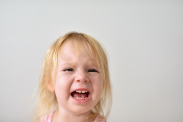 Portrait of cute crying baby