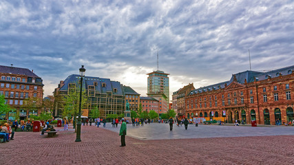 Strasbourg, France - April 30, 2012: Old city hall on Place Kleber Square in the historic center, or Grande Ile in Strasbourg in Grand East region, France. People on the background