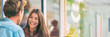 © Maridav - Happy couple talking laughing friends conversation outdoor city lifestyle panorama banner background. Asian girl smiling at man on date.