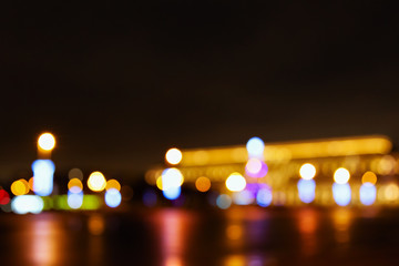 Wall Mural - Street city lights out of focus at night, bokeh