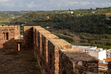 Rampart stone walls of the Castelo de Silves (Silves Castle) in Portugal, overlooking the city