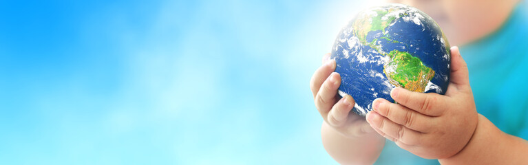 hand of a baby holding world earth